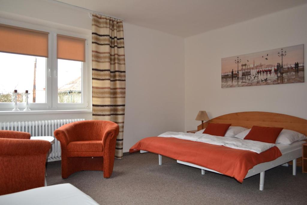 Postel nebo postele na pokoji v ubytování Apartman JaS