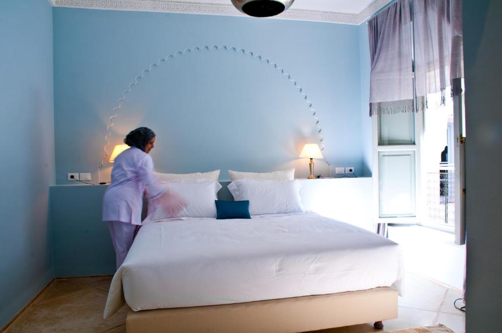 Postel nebo postele na pokoji v ubytování Riad Nashira & Spa