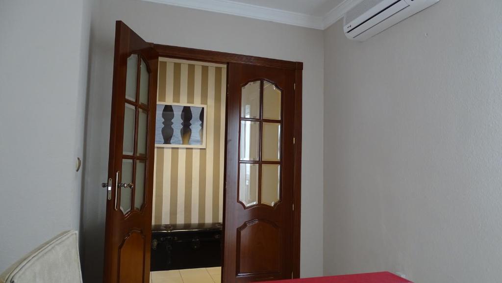 Posteľ alebo postele v izbe v ubytovaní Cosy Caleta Apartment