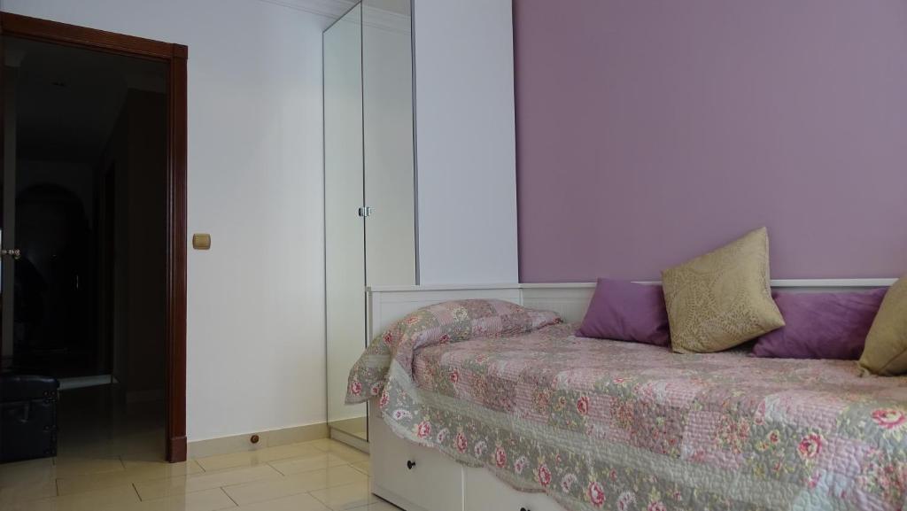 Posteľ alebo postele v izbe v ubytovaní Cosy Caleta Apartment