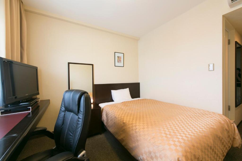 TV a/nebo společenská místnost v ubytování Hotel nanvan Yaizu