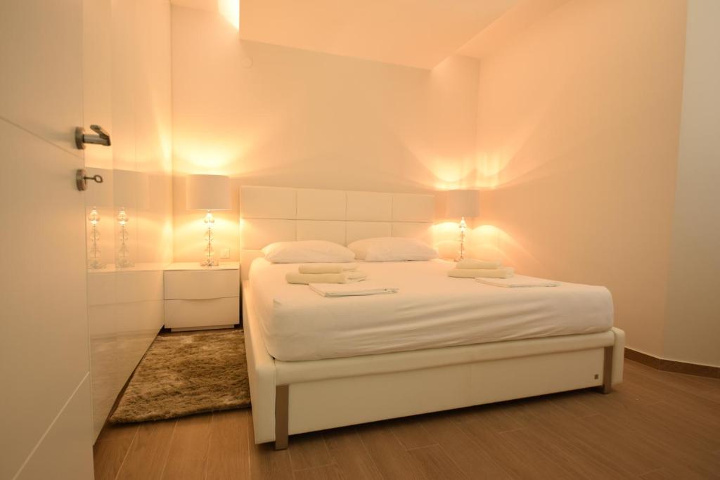 Postel nebo postele na pokoji v ubytování Apartments Lofiel