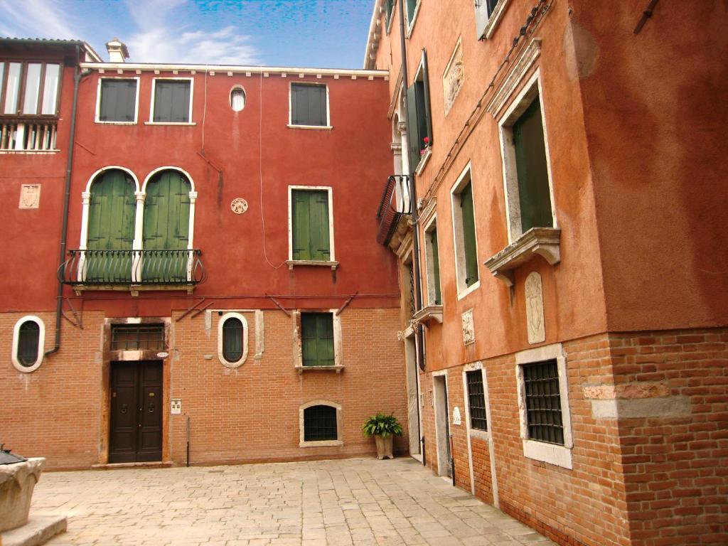 an alley in an old city with buildings at Cà Bollani in Venice