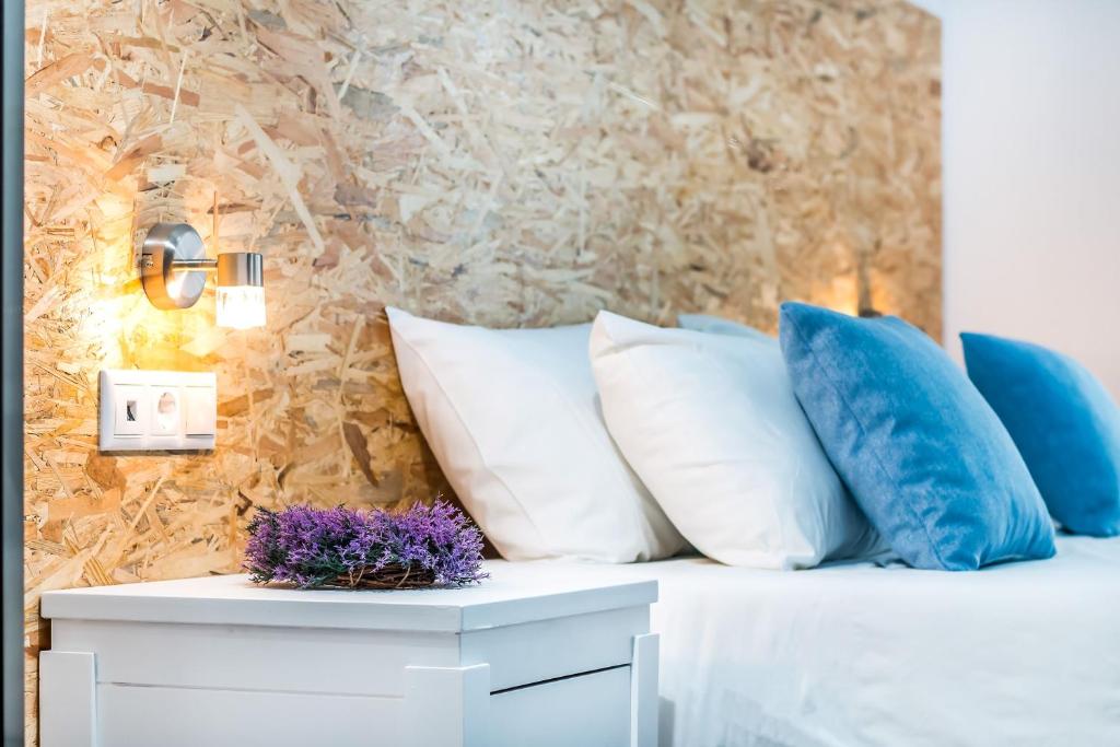 Posteľ alebo postele v izbe v ubytovaní Tinas Plus Hotel