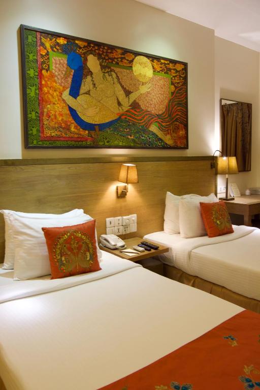 Postel nebo postele na pokoji v ubytování Le Sutra Hotel, Khar, Mumbai