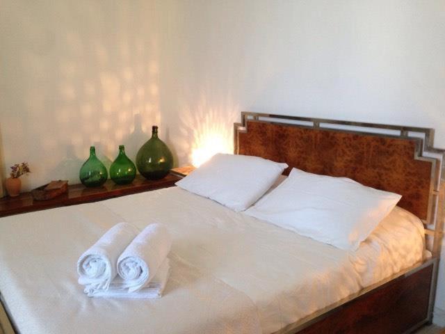 Postel nebo postele na pokoji v ubytování Volver B&B