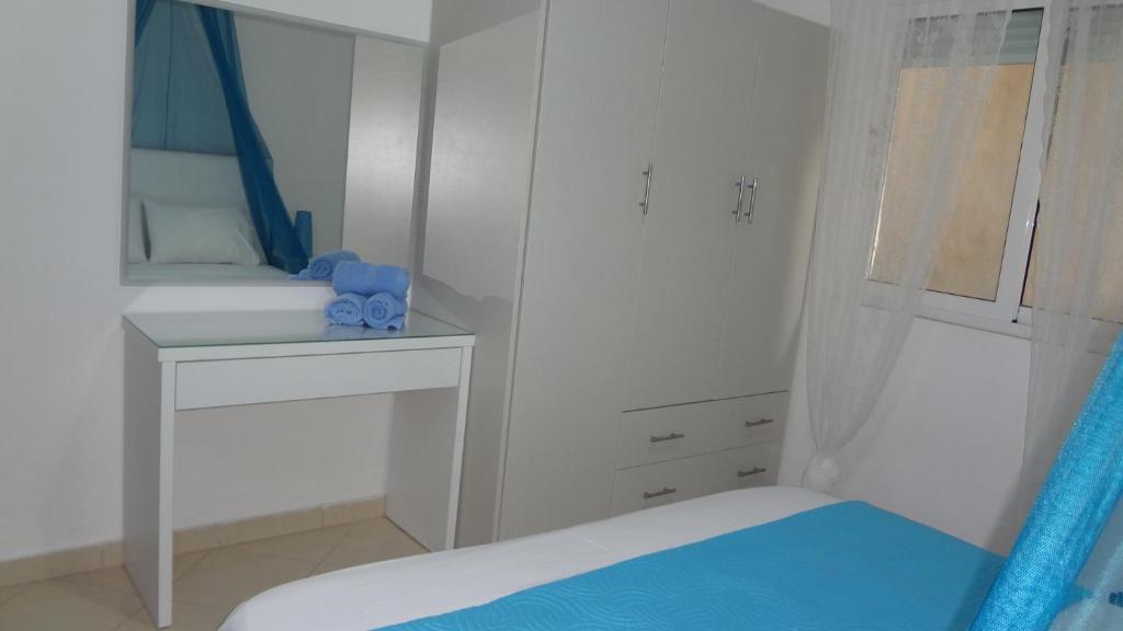 Postel nebo postele na pokoji v ubytování Apartment Katherina Sarande