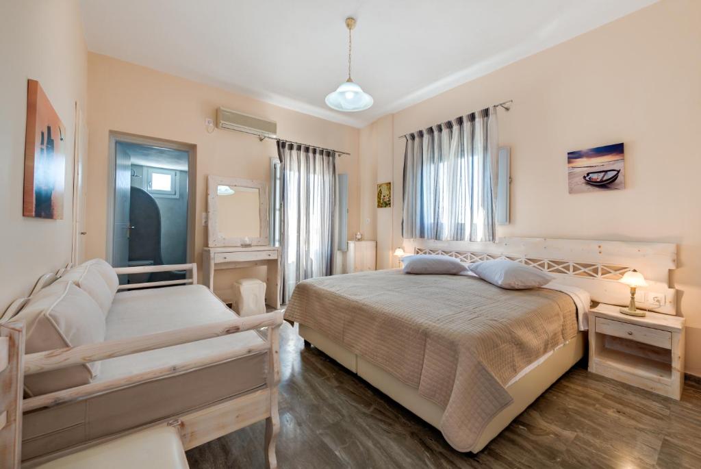 Postel nebo postele na pokoji v ubytování Villa Aegeon