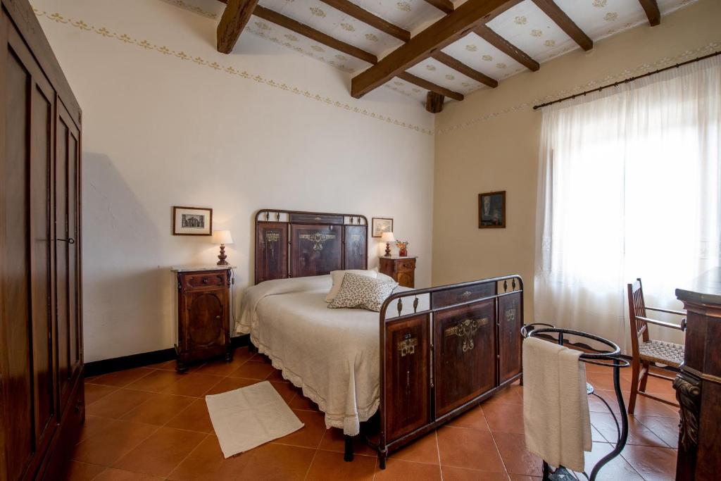 Postel nebo postele na pokoji v ubytování Fattoria del Colle