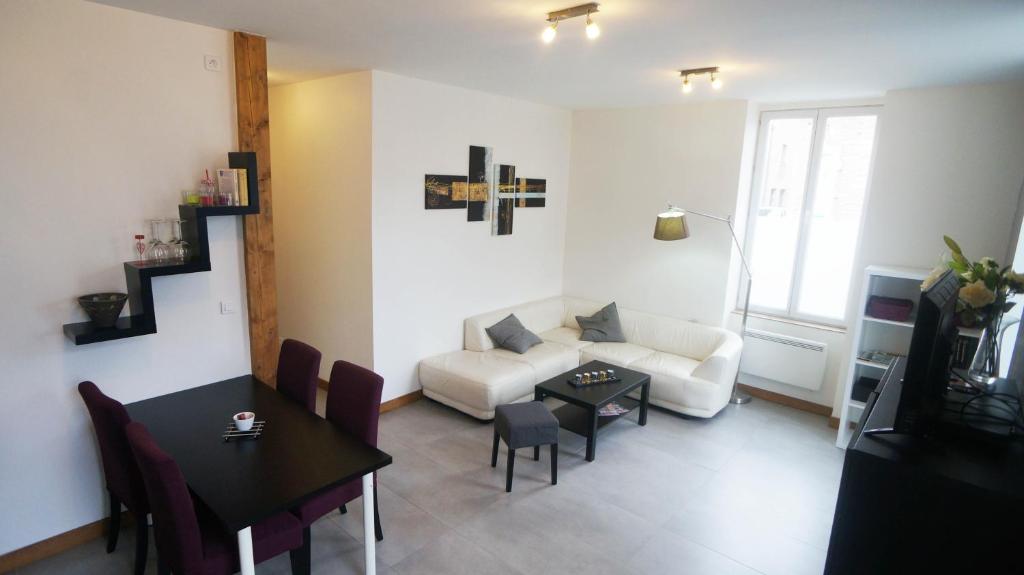Ruang duduk di Le Puligny, appartement classé 3 étoiles