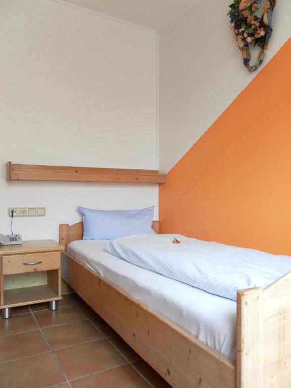 Postel nebo postele na pokoji v ubytování Landgasthof Asum