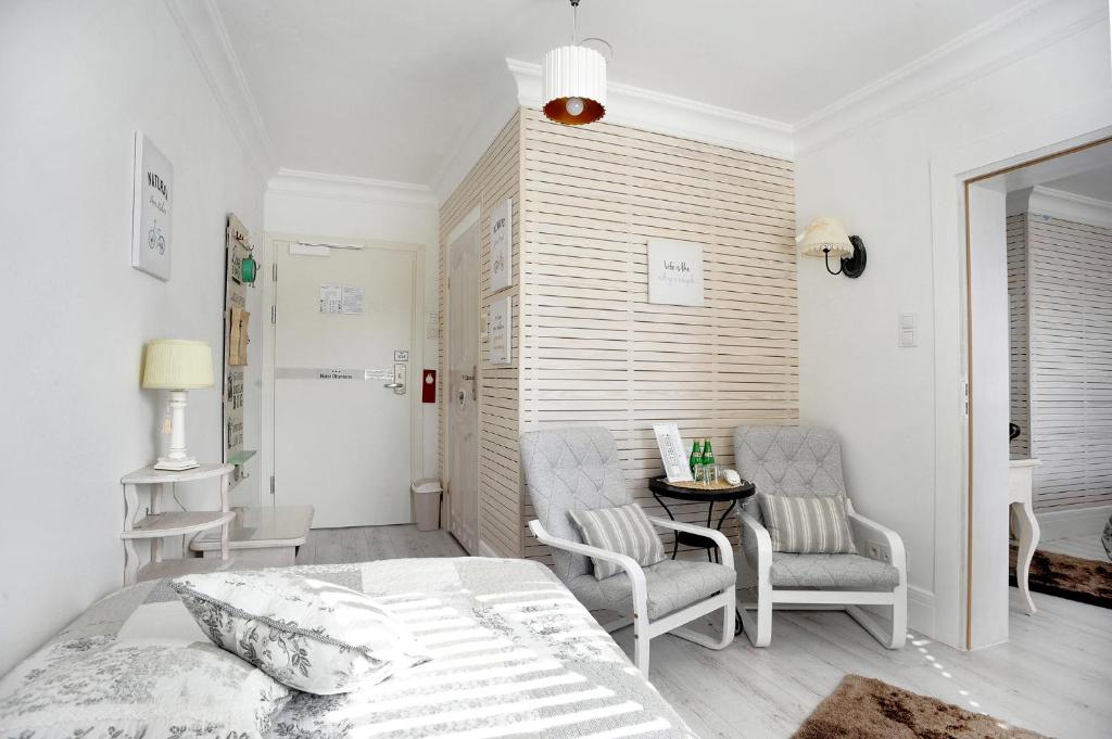 Postel nebo postele na pokoji v ubytování Hotel Ottaviano