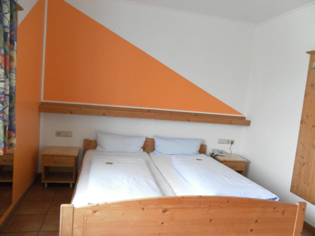 Postel nebo postele na pokoji v ubytování Landgasthof Asum
