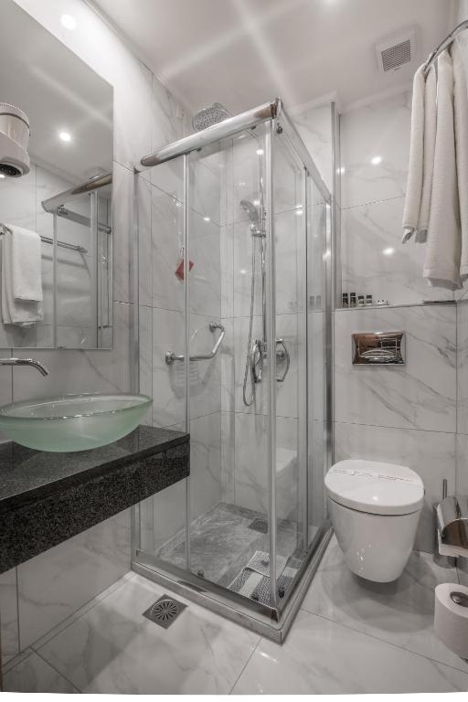 Koupelna v ubytování Rex Hotel