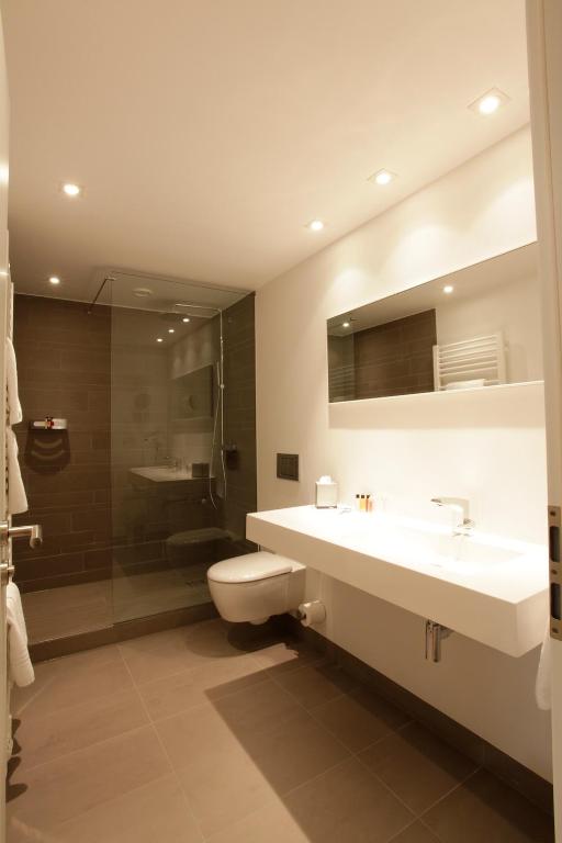Koupelna v ubytování Hotel Gude