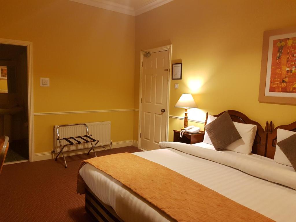 Postel nebo postele na pokoji v ubytování Royal Spa Hotel
