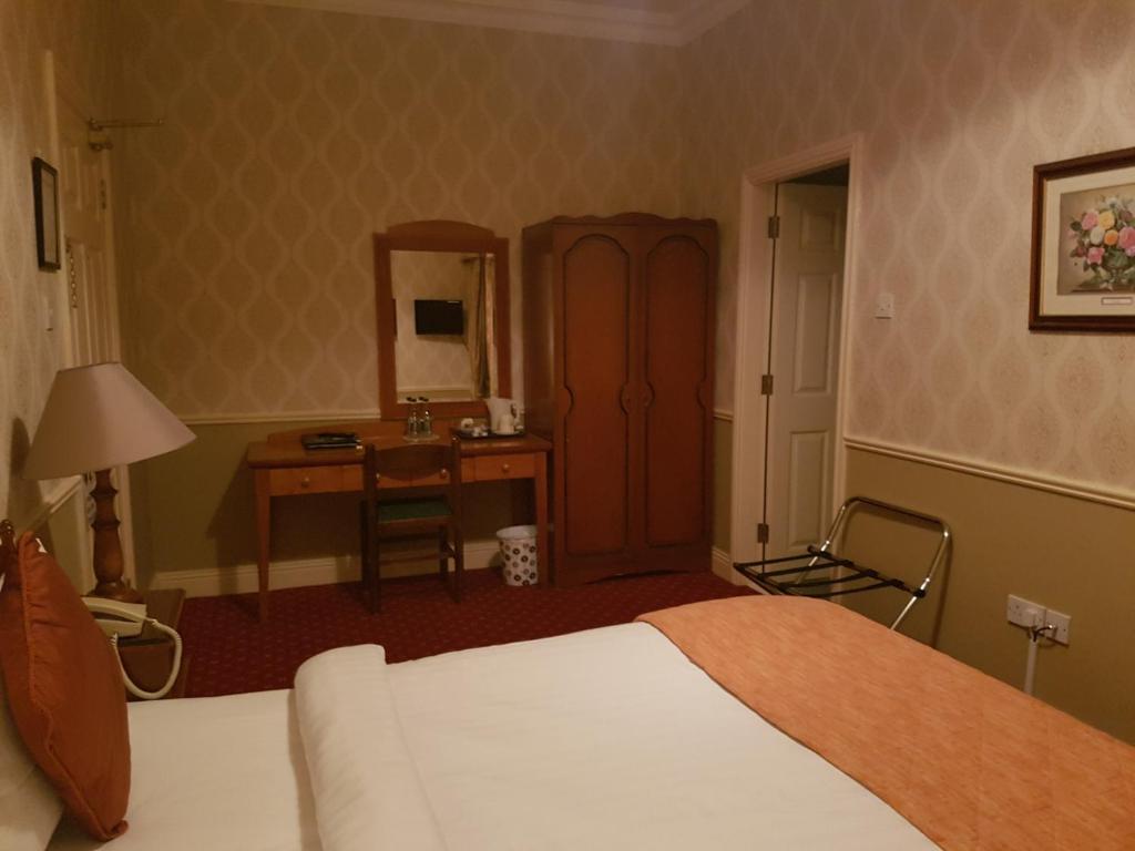 Postel nebo postele na pokoji v ubytování Royal Spa Hotel