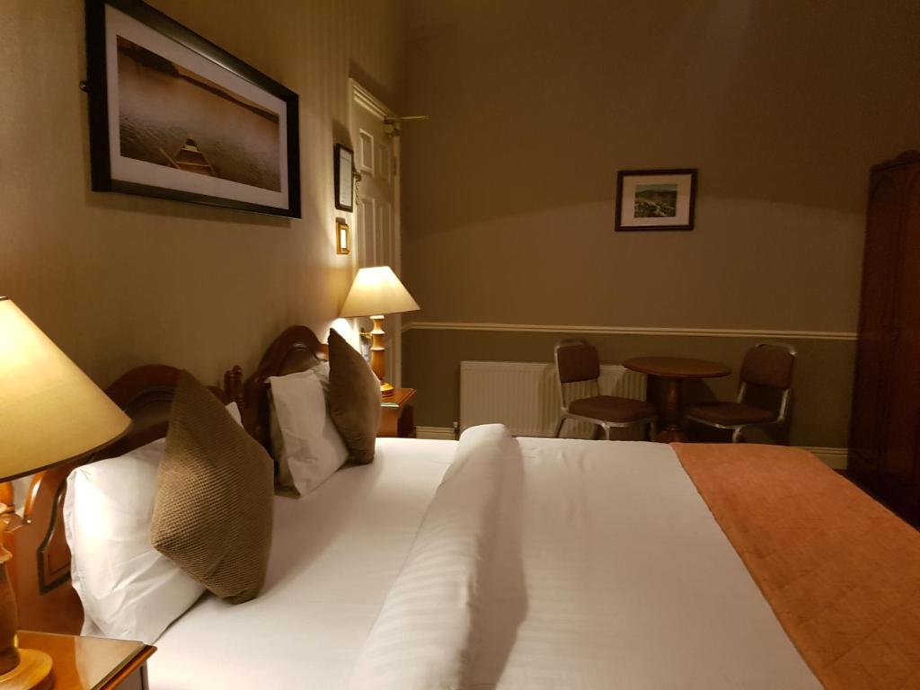 Postel nebo postele na pokoji v ubytování Royal Spa Hotel