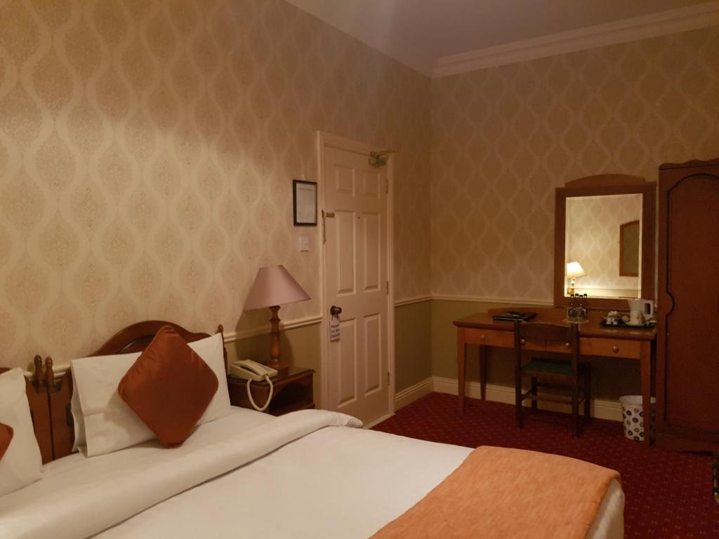 Postel nebo postele na pokoji v ubytování Royal Spa Hotel