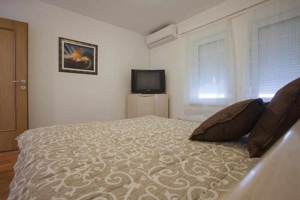 Postel nebo postele na pokoji v ubytování Guesthouse Rota