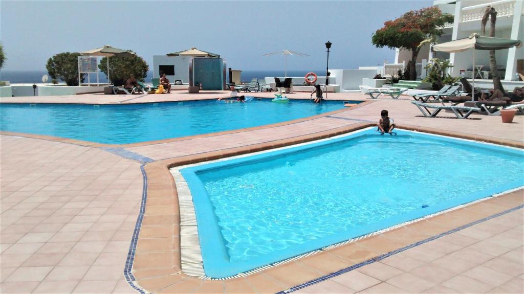 Apartamento Renovado,vistas piscina, aire acondicionado,wifi - Apartment With Pool View