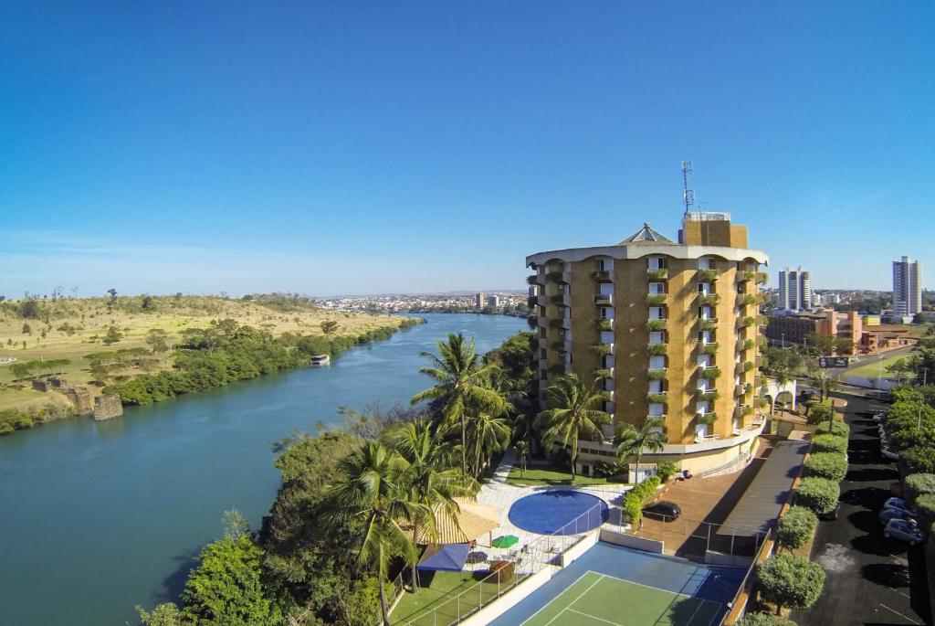 a view of a river from a building at Hotel Beira Rio in Itumbiara