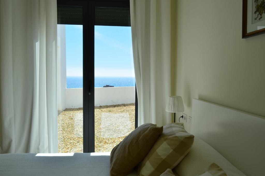 Posteľ alebo postele v izbe v ubytovaní Apartamentos Macenas