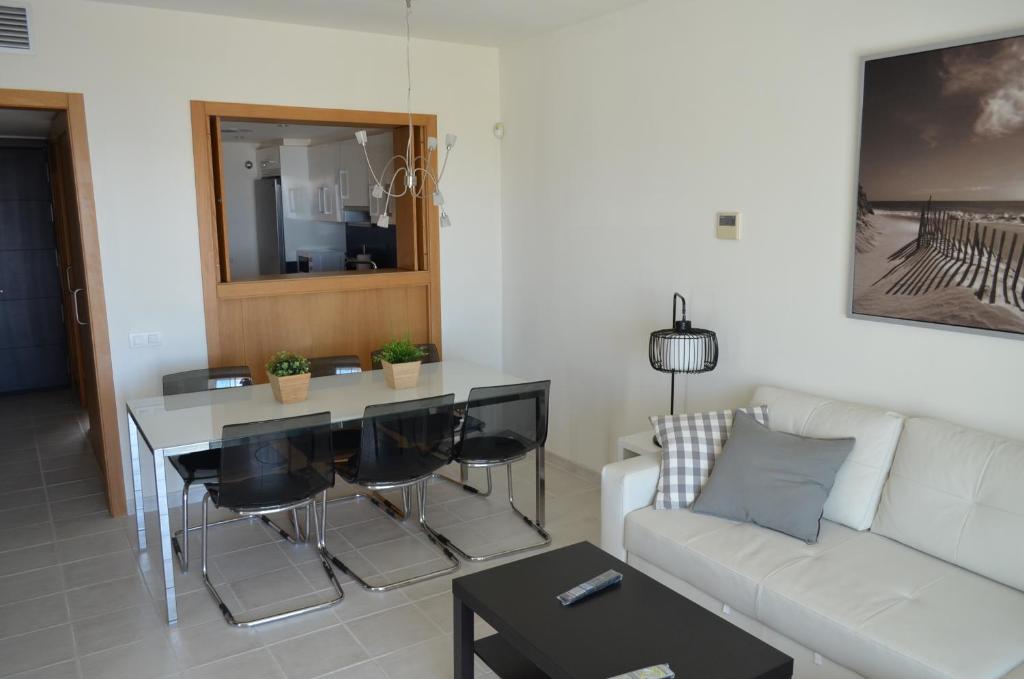 Posedenie v ubytovaní Apartamentos Macenas