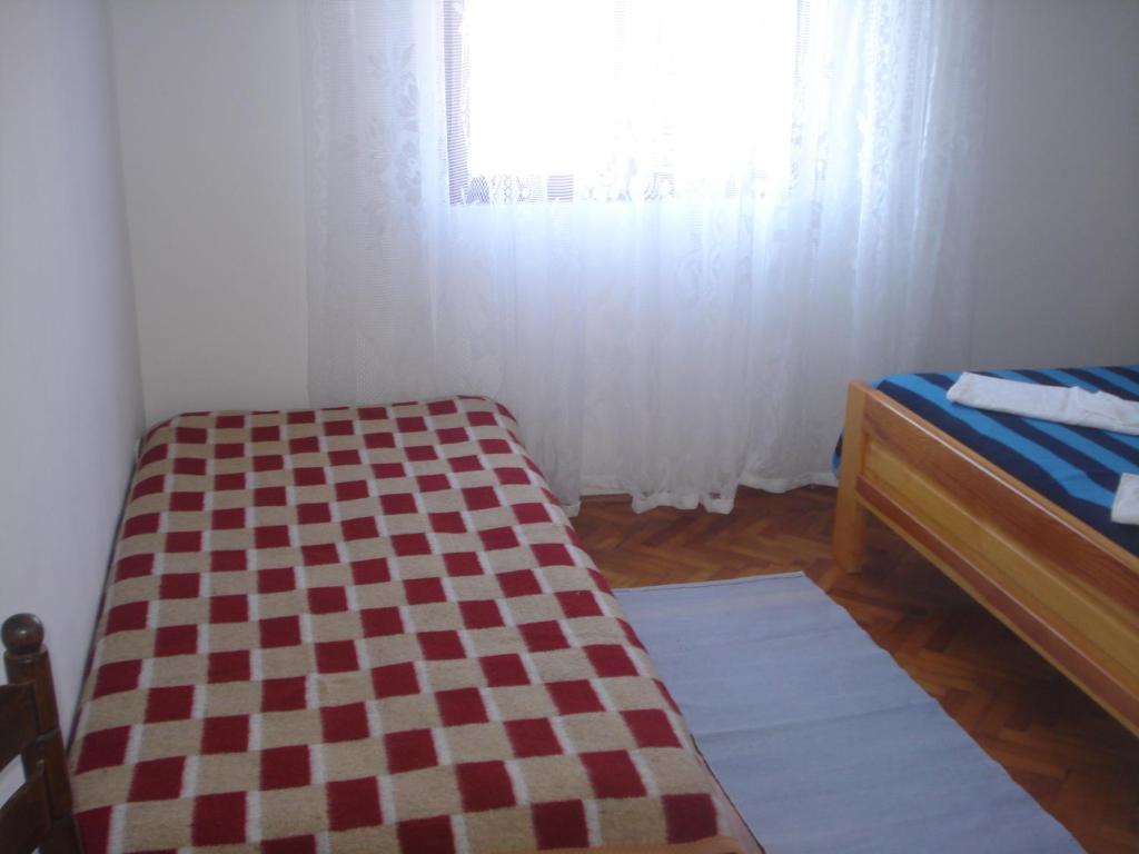 Posteľ alebo postele v izbe v ubytovaní Apartments San Giorgio