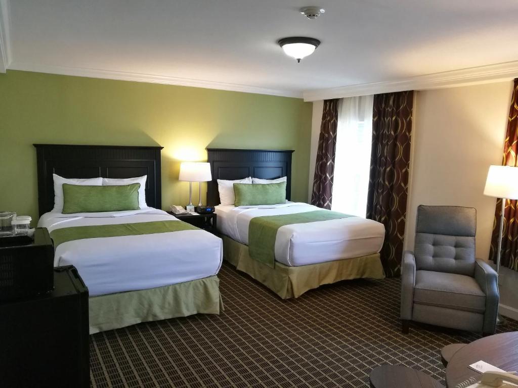Postel nebo postele na pokoji v ubytování The Wilshire Grand Hotel