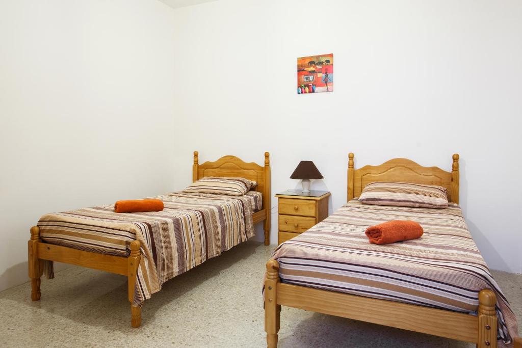 Postel nebo postele na pokoji v ubytování Dolphin Court