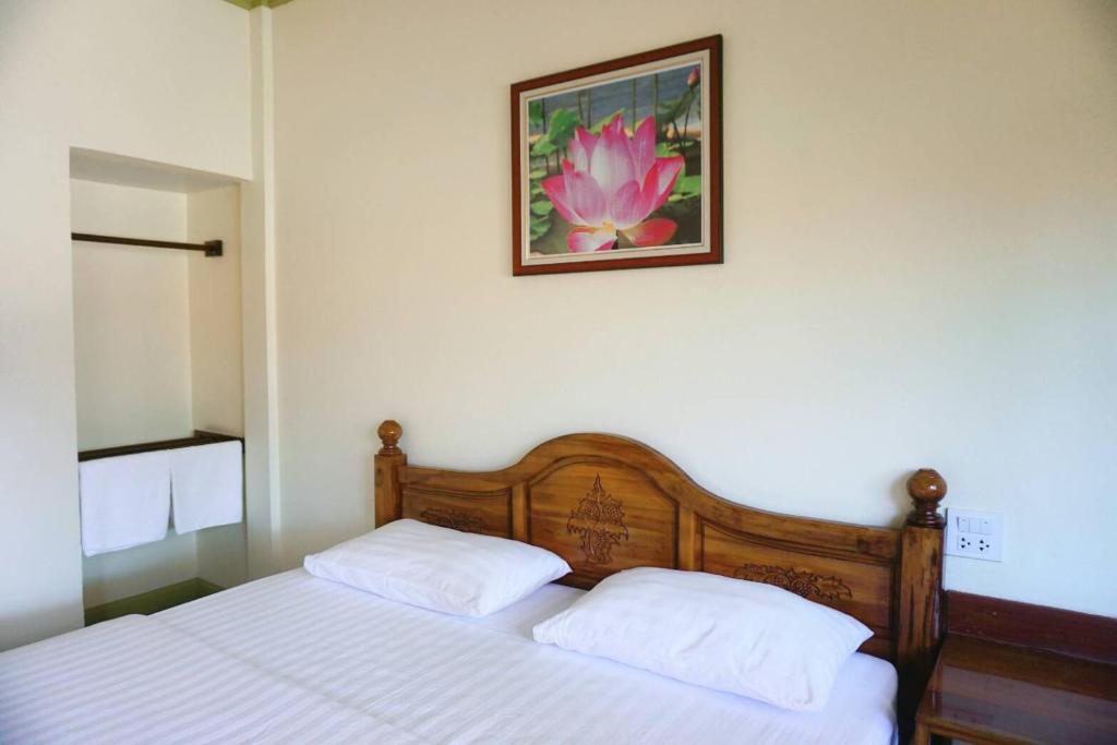 Postel nebo postele na pokoji v ubytování Anyamanee Resort Trat