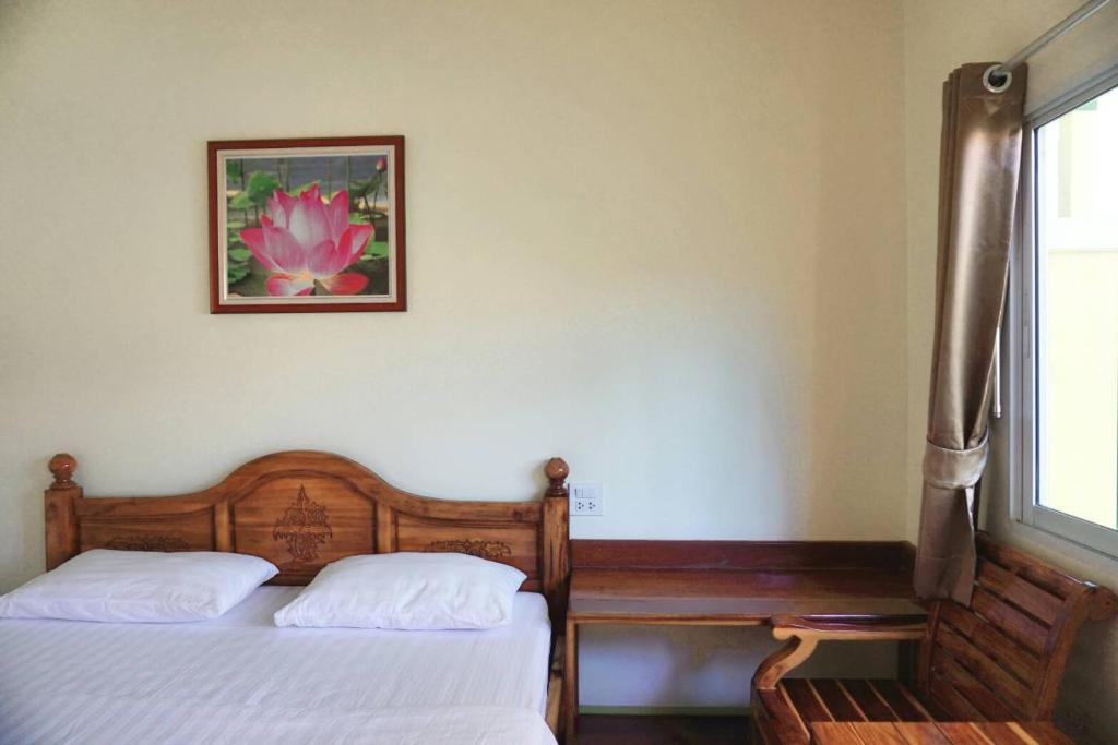 Postel nebo postele na pokoji v ubytování Anyamanee Resort Trat