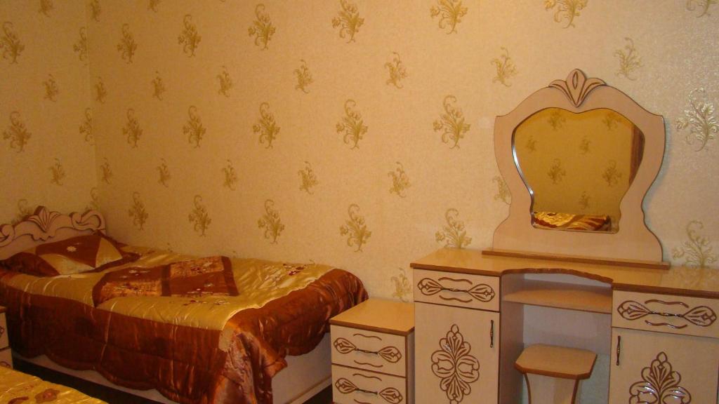 Postel nebo postele na pokoji v ubytování Guest House Tavaduri