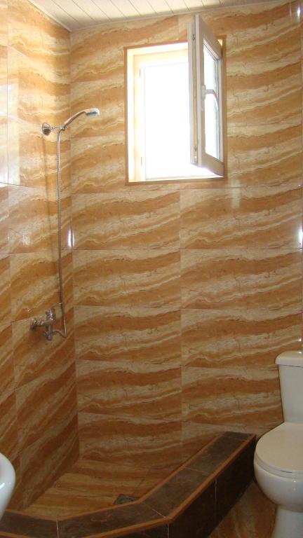 Koupelna v ubytování Guest House Tavaduri