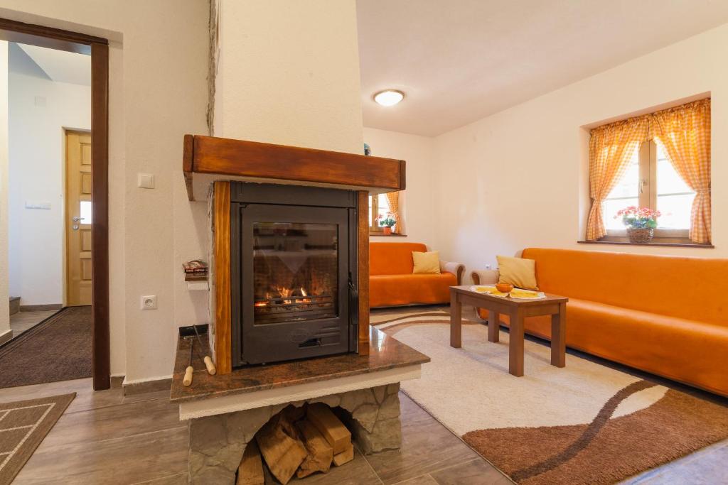 Area soggiorno di Guest House Rustico