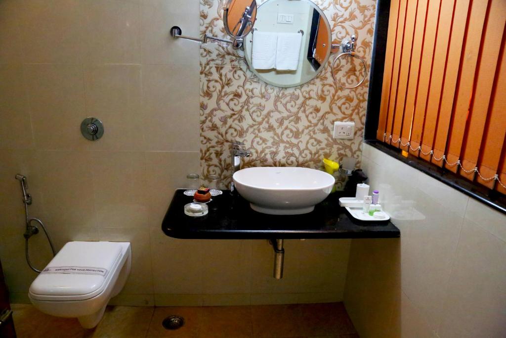 Koupelna v ubytování Hotel Goan Heritage