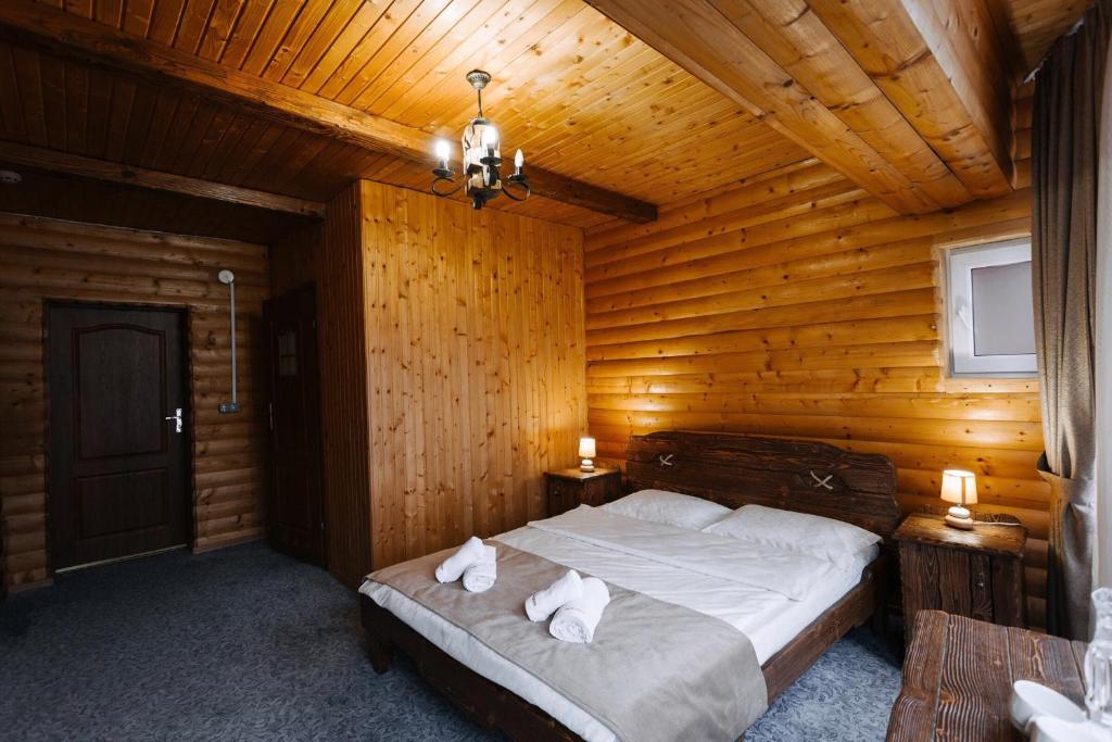 Postel nebo postele na pokoji v ubytování Hotel Marilen