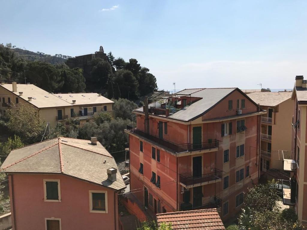 an aerial view of a city with buildings and trees at Affittacamere Da Luca in Bonassola