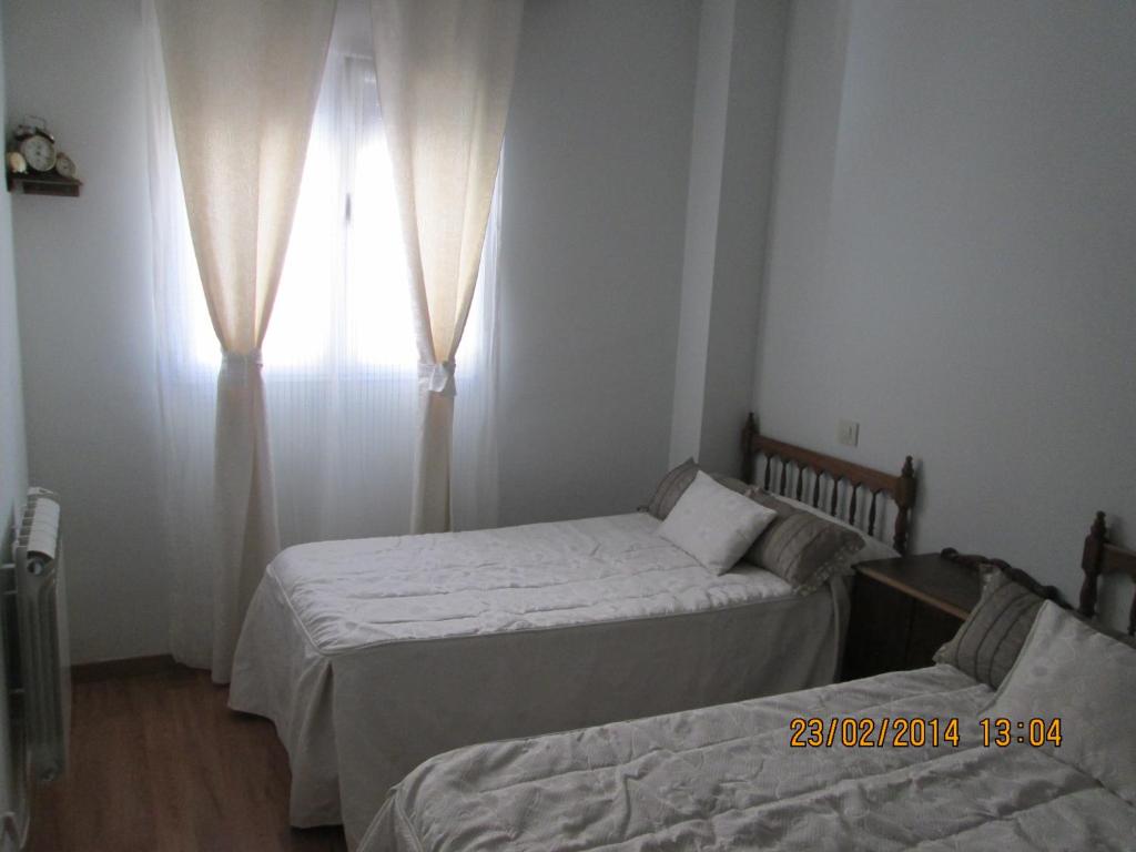 Postel nebo postele na pokoji v ubytování serranía del tajo