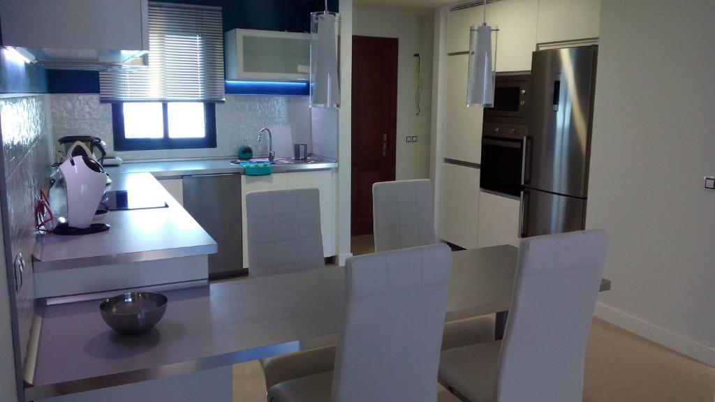 Kuchyň nebo kuchyňský kout v ubytování Ocean Front Apartment (WiFi)