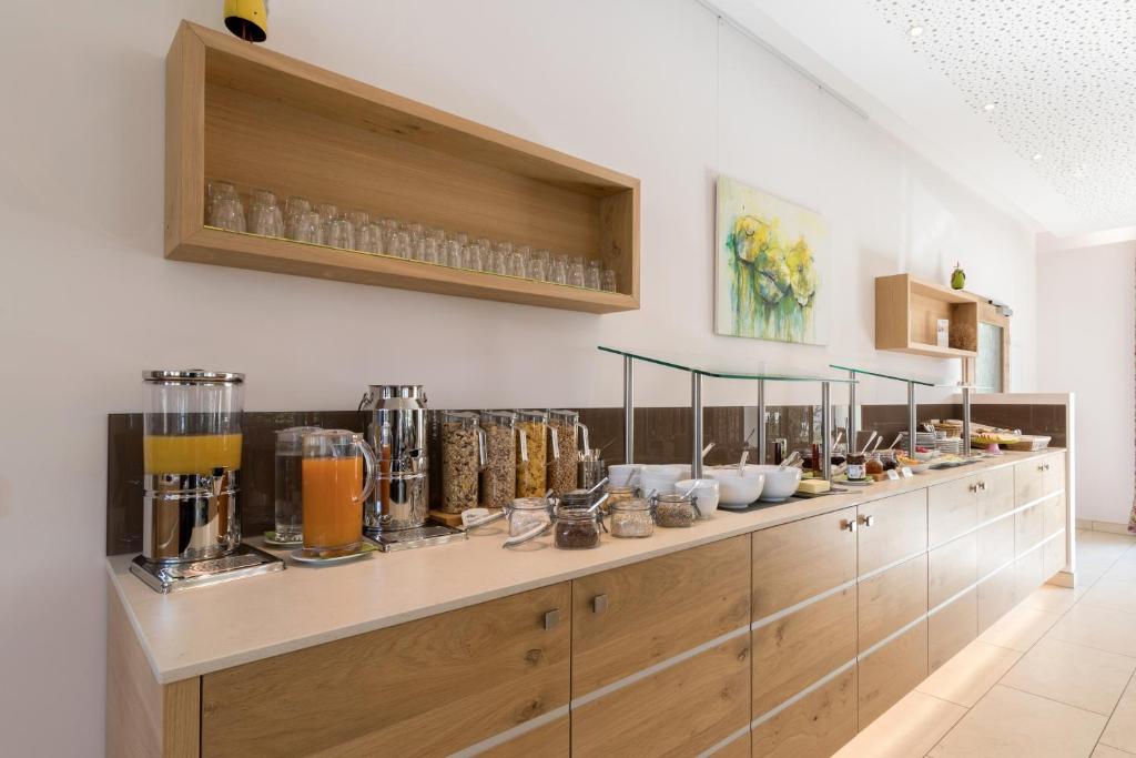 Kuchyň nebo kuchyňský kout v ubytování Hotel Bauer garni