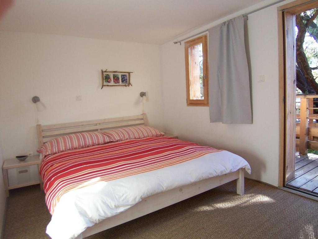 Postel nebo postele na pokoji v ubytování Albaria Lodge