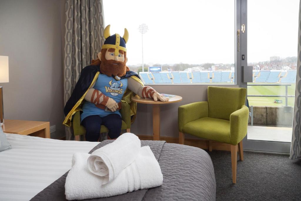 Postel nebo postele na pokoji v ubytování Headingley Lodge