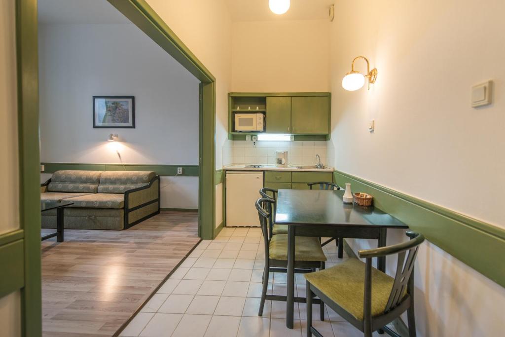 Posezení v ubytování Abbázia Club Hotel Kék