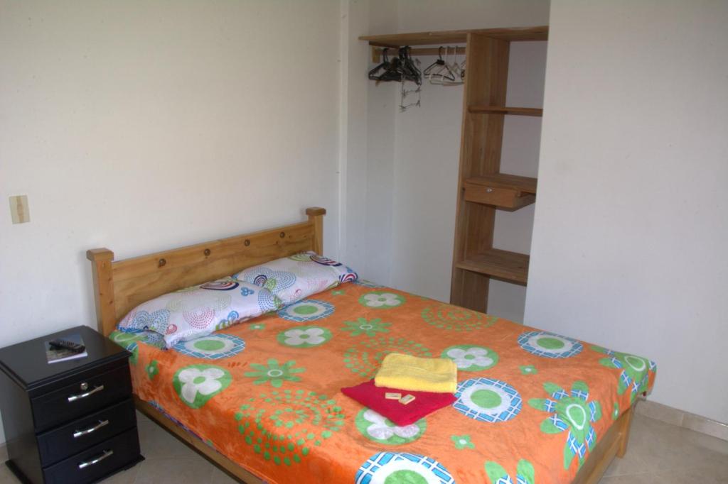 Postel nebo postele na pokoji v ubytování Hotel Internacional Jardín