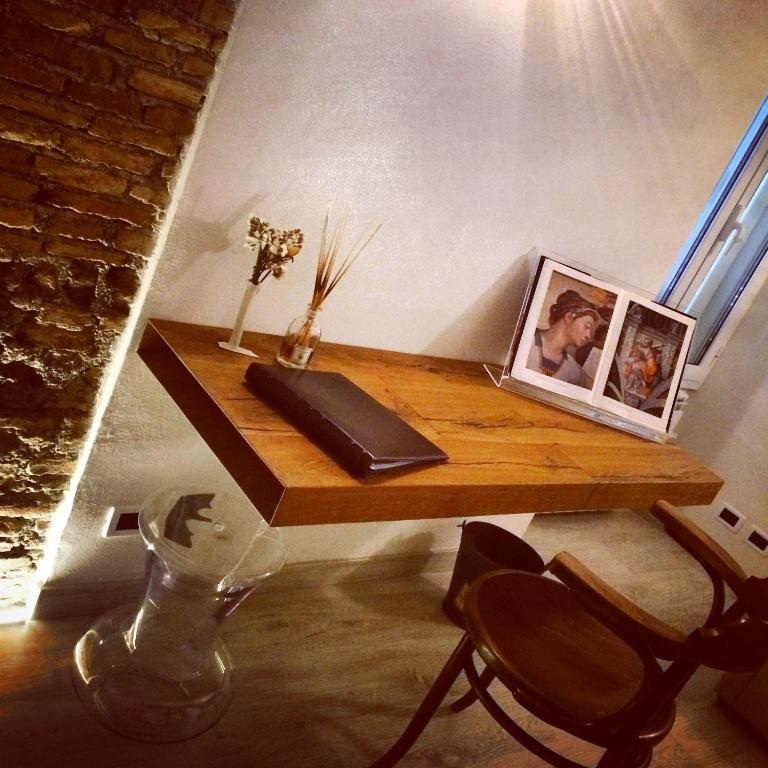 A television and/or entertainment centre at Cibele Bed&Breakfast