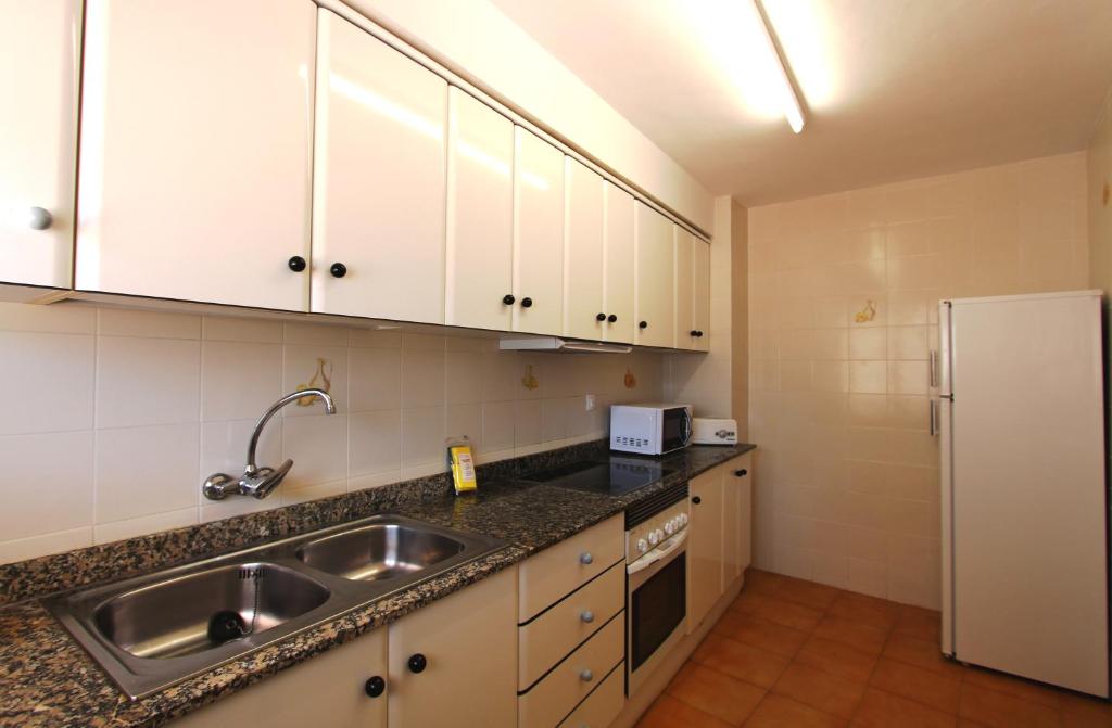 Kuchyň nebo kuchyňský kout v ubytování Residencial Super Stop Palafrugell