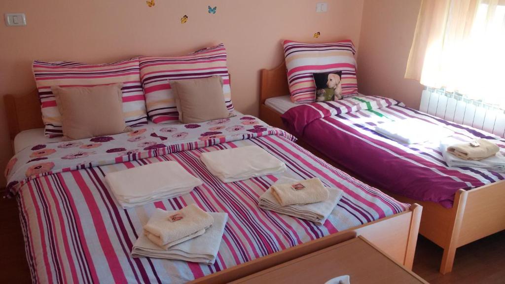 Postel nebo postele na pokoji v ubytování Osterija Na Planinci