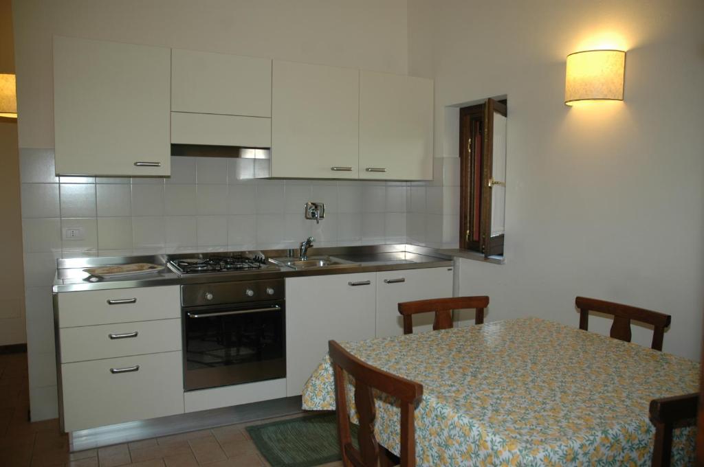 Kuchyňa alebo kuchynka v ubytovaní Residenza Torre Acquatino